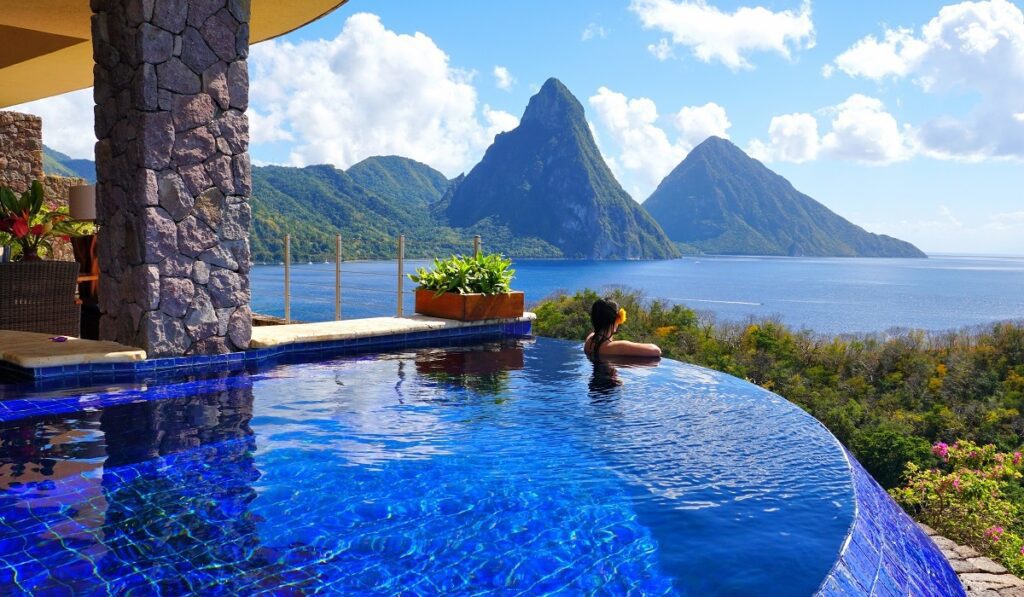 saint lucia. Saint Lucia. Saint Lucia may provide the most unforgettable island vacation in the Caribbean. There is far more here than fabulous beaches, great watersports, and lush forests with excellent trails, although they alone will provide a one-of-a-kind vacation. The island’s major attraction are the two volcanos plugs referred to as the Pitons. .