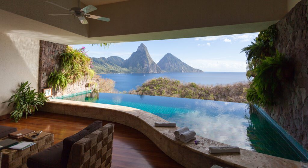 saint lucia. Saint Lucia. Saint Lucia may provide the most unforgettable island vacation in the Caribbean. There is far more here than fabulous beaches, great watersports, and lush forests with excellent trails, although they alone will provide a one-of-a-kind vacation. The island’s major attraction are the two volcanos plugs referred to as the Pitons. .