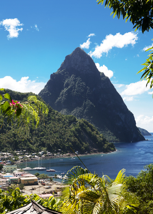 saint lucia. Saint Lucia. Saint Lucia may provide the most unforgettable island vacation in the Caribbean. There is far more here than fabulous beaches, great watersports, and lush forests with excellent trails, although they alone will provide a one-of-a-kind vacation. The island’s major attraction are the two volcanos plugs referred to as the Pitons. .