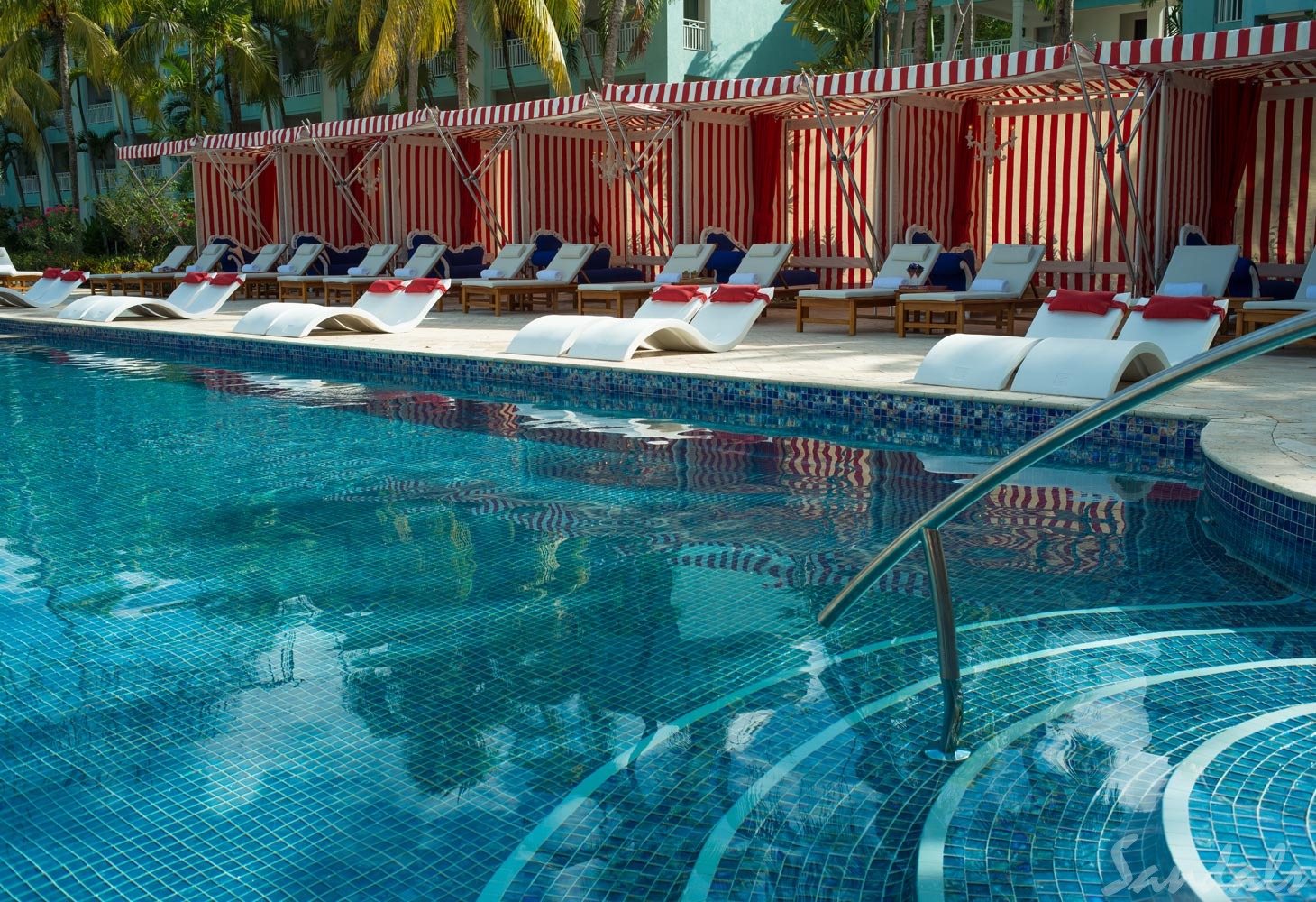 Sandals Barbados. Sandals Barbados. You will find the lovely Sandals Barbados in the St. Lawrence Gap area of Barbados. It is an all-inclusive resort with swim-up suites, free Wi-Fi, a dive shop and so much more for you to have a beautiful and amazing time. It is situated next door to another Sandals property - Sandals Royal Barbados. The two resorts share common grounds, so you get to stay at one and play at two. .