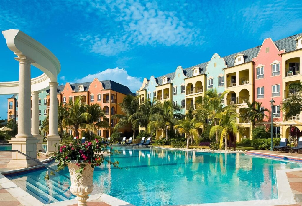 Sandals South Coast. Sandals South Coast. Sandals South Coast offers the best in an all-beachfront Resort nestled on a pristine beach, complete with European splendor. One of the newest additions to the Resort is the overwater bungalows, over-the-water chapel, and an over-the-water bar. Sandals South Coast (or any Sandals resort) truly brings the guest closer to the water than ever before..