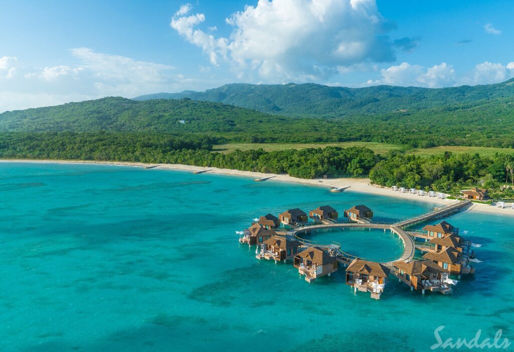 Sandals South Coast. Sandals South Coast. Sandals South Coast offers the best in an all-beachfront Resort nestled on a pristine beach, complete with European splendor. One of the newest additions to the Resort is the overwater bungalows, over-the-water chapel, and an over-the-water bar. Sandals South Coast (or any Sandals resort) truly brings the guest closer to the water than ever before..