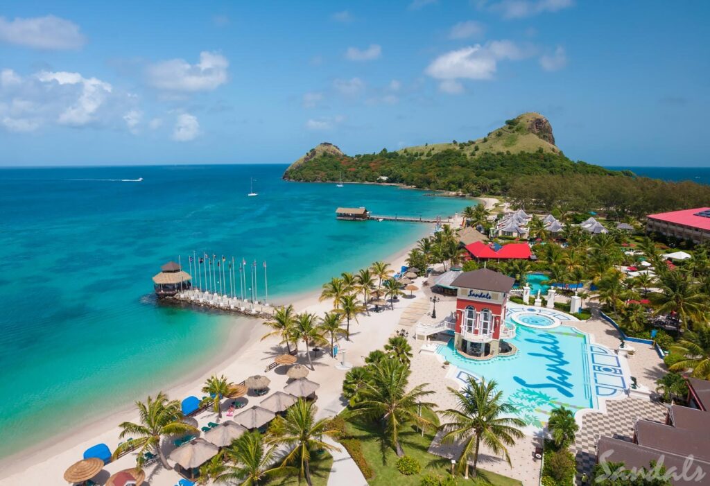 saint lucia. Sandals Grande St. Lucian. Located on its very own peninsula, Sandals Grande St. Lucian is where you need to be if you are looking for a postcard vacation. You will find this resort with the calmest waters of the Atlantic Ocean nestled into the west end of Rodney Bay. You can never get enough of the views at this resort, from ocean views to views of a grass-draped mountainscape. As one of the best Sandals resorts for honeymooners, this all-inclusive Sandals Grande St. Lucian and adult--only paradise makes for a wonderful romantic vacation..