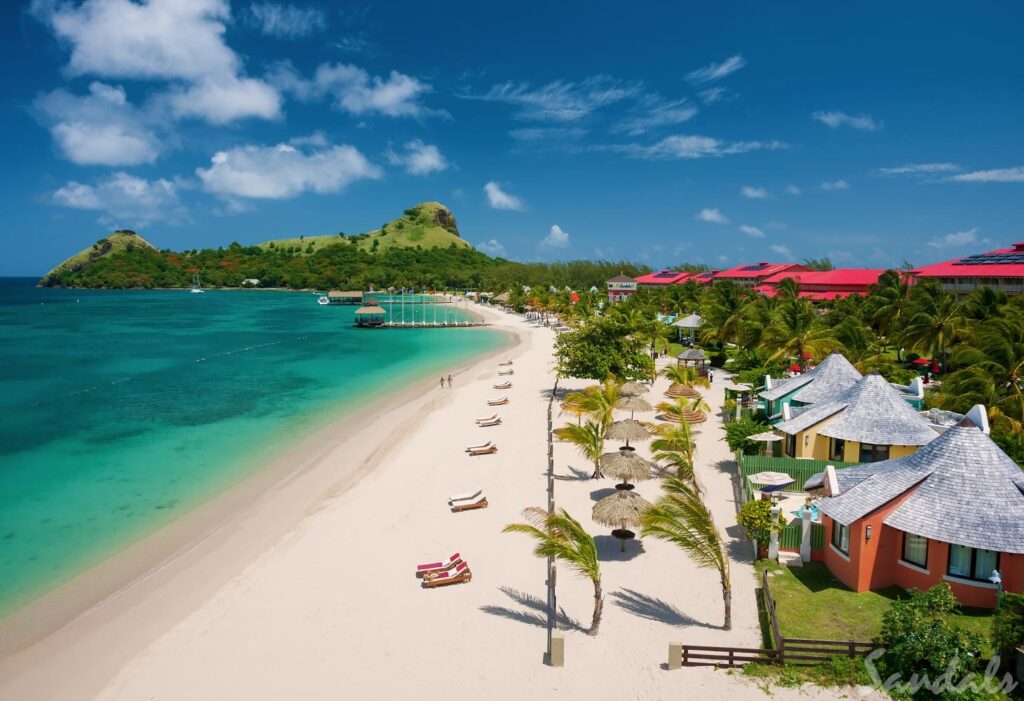 saint lucia. Sandals Grande St. Lucian. Located on its very own peninsula, Sandals Grande St. Lucian is where you need to be if you are looking for a postcard vacation. You will find this resort with the calmest waters of the Atlantic Ocean nestled into the west end of Rodney Bay. You can never get enough of the views at this resort, from ocean views to views of a grass-draped mountainscape. As one of the best Sandals resorts for honeymooners, this all-inclusive Sandals Grande St. Lucian and adult--only paradise makes for a wonderful romantic vacation..
