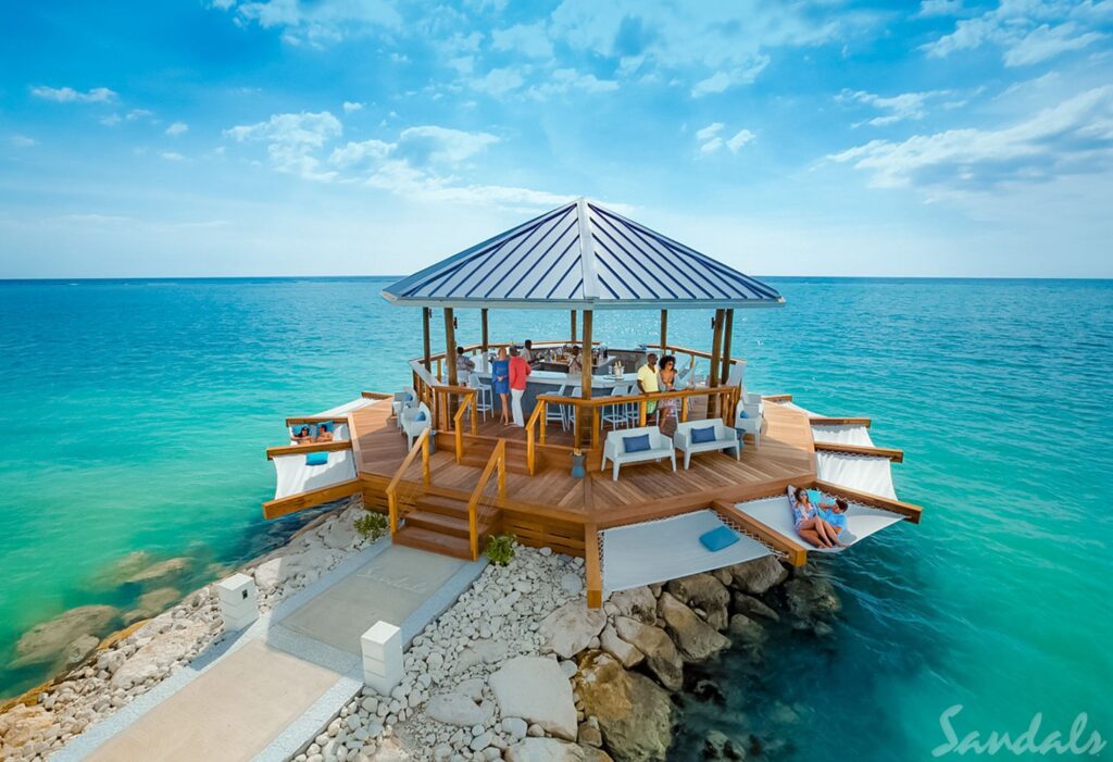 Sandals South Coast. Sandals South Coast. Sandals South Coast offers the best in an all-beachfront Resort nestled on a pristine beach, complete with European splendor. One of the newest additions to the Resort is the overwater bungalows, over-the-water chapel, and an over-the-water bar. Sandals South Coast (or any Sandals resort) truly brings the guest closer to the water than ever before..